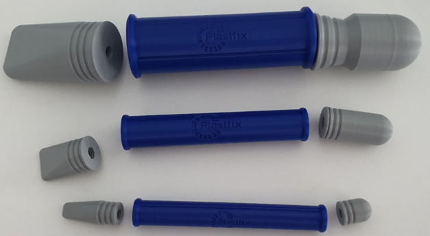 Three disassembled, blue-grey plastipush hand spikes in different sizes.